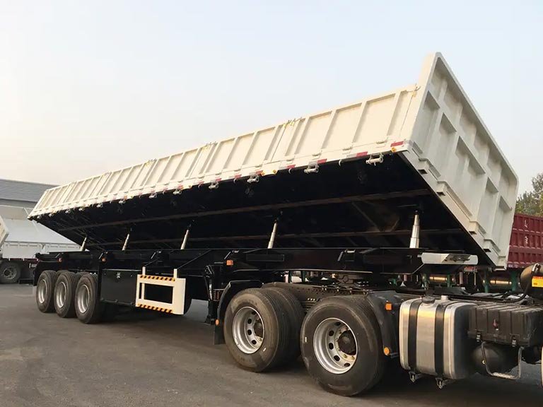 Qu'est-ce qu'une remorque à bascule latérale